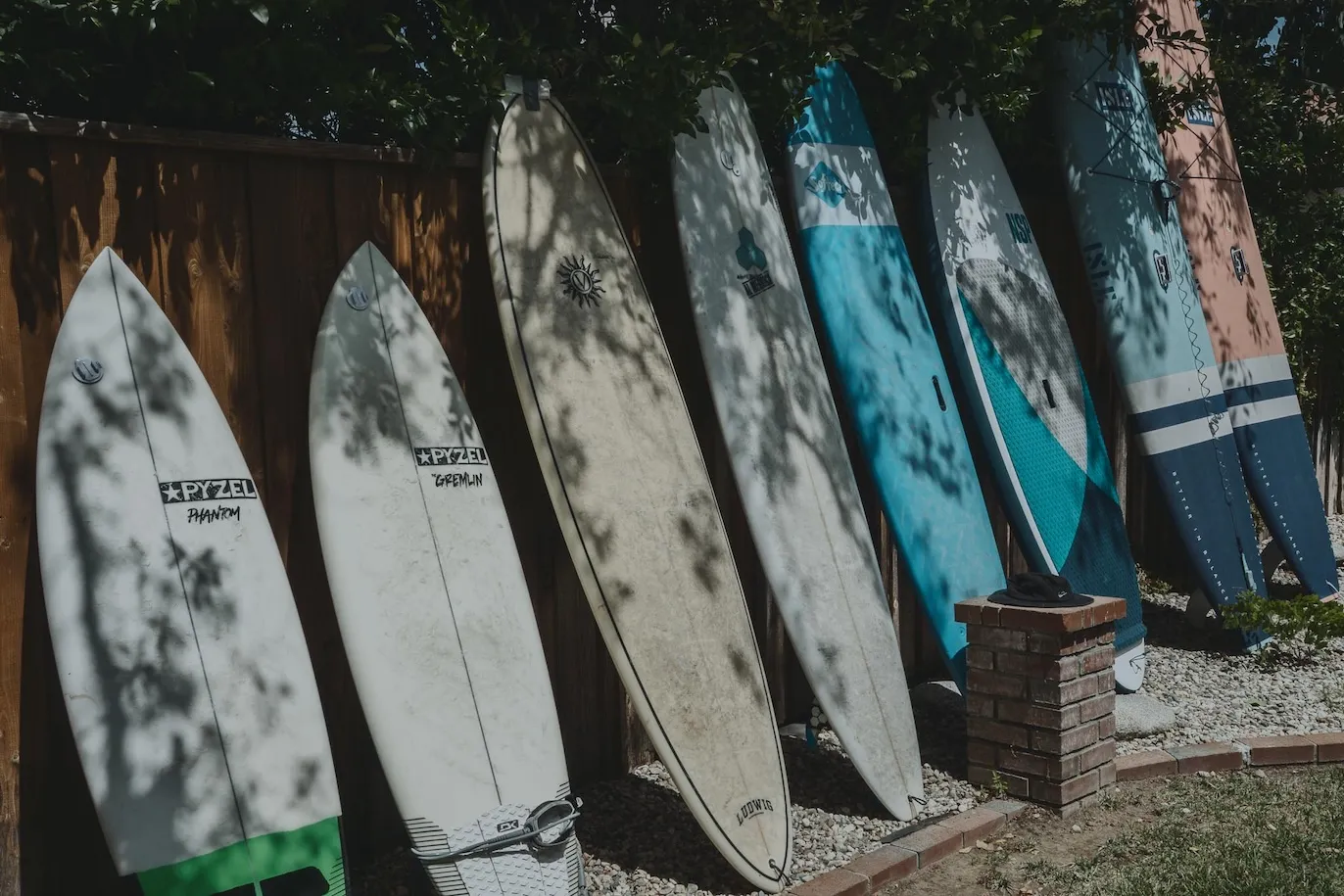 my real quiver (apr 2022) surfboards on display in my backyard